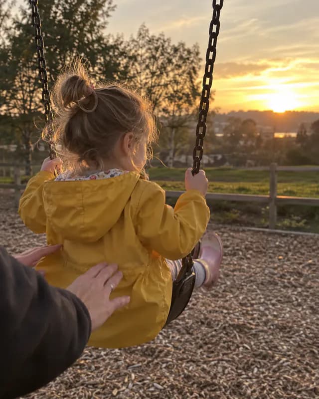 AI-generated photo: a toddler on a swing, the post above the letter on the sample timeline